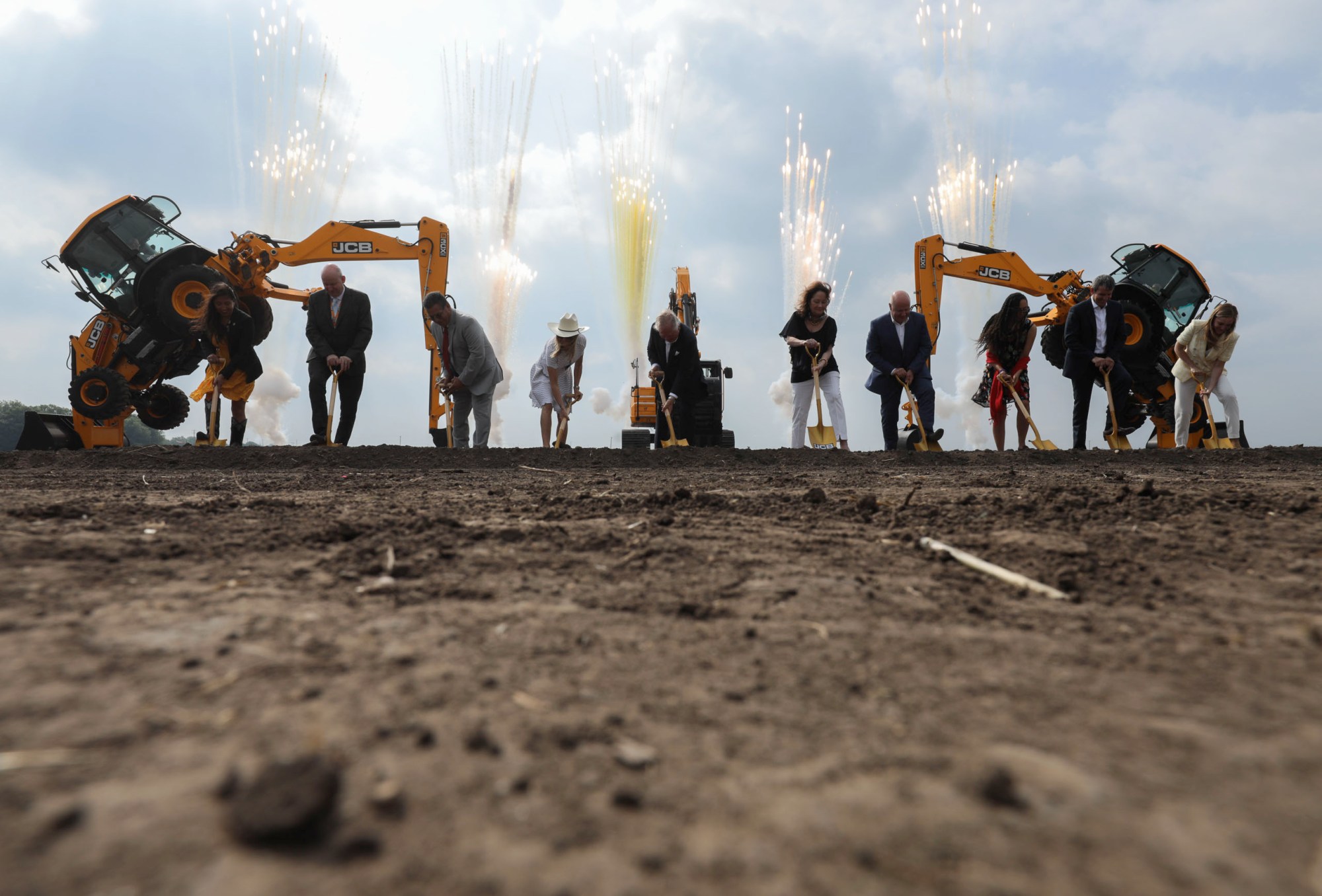 Industrial construction site with excavators at a large factory development